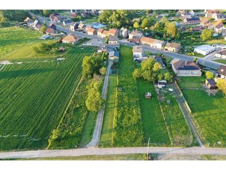 mooi perceel bouwgrond voor half open bebouwing met z-w oriëntatie