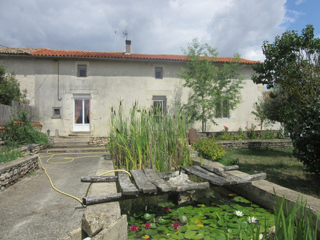 maison en pierre bien rénovée avec 4 chambres  dépendance et jardin  dans un hameau calme