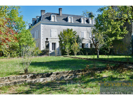 maison de maitre+dependances et parc en coeur de ville