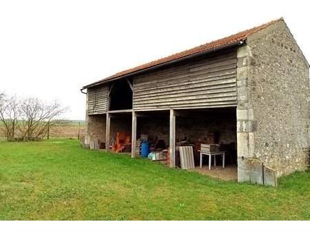 bâtiment à usage de dépendance  sur terrain en partie constructible.