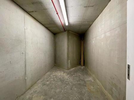 thiry/roodebeek - cave + parking intérieur attenant