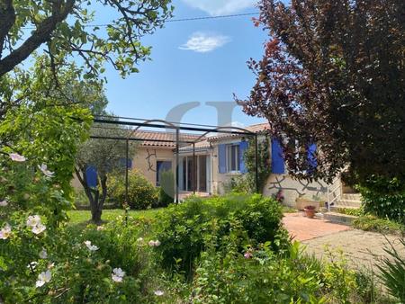 villa de plain-pied avec garage  dépendances et terrain attenant à vendre à grillon