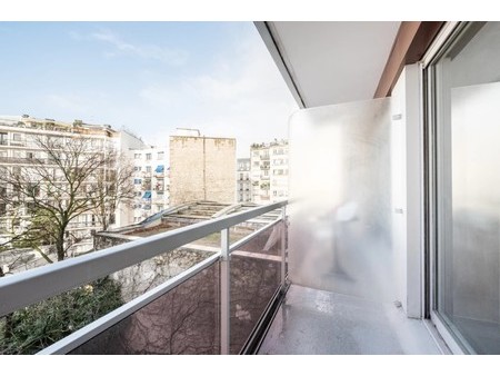 paris 16 - marche de passy - studio avec vue degagee et balcon expose ouest - poss parking