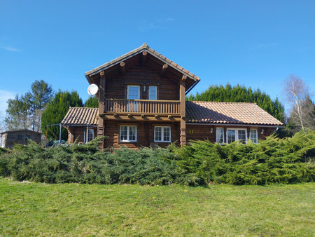 maison en bois sur 1800m2 de terrain dans un parc naturel