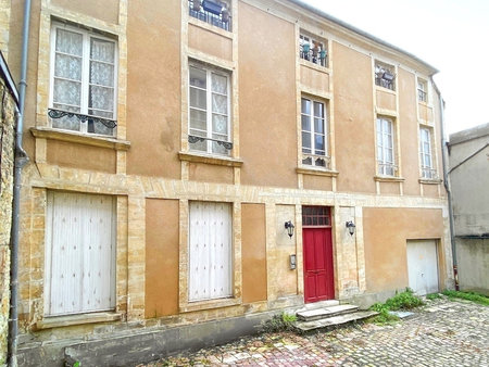 immeuble de 130 m2 / 4 appartements / caves / garage