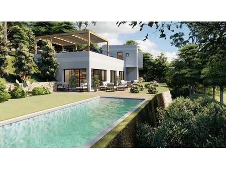 livraison prévue 08-2022.superbe villa contemporaine située dans un quartier renommé  à...