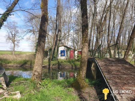 ancienne base de loisirs 4 hectares de terrain  une maisonnette  un étang