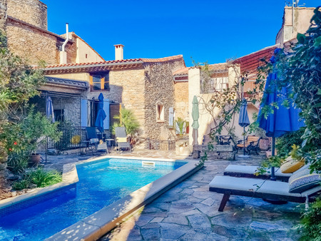 sublime maison familiale en pierre avec gîtes  jardin  terrasses  piscine et remise avec s