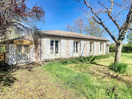 maison de 145 m2  4 chambres  double garage  véranda et jardin.