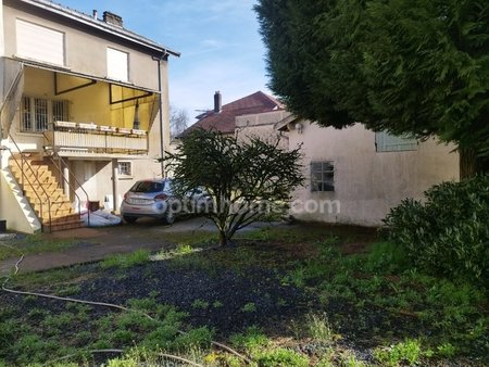 maison de 90 m² avec garage et jardin