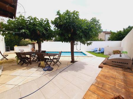 au calme  villa de type 5  de 151m2 à maureilhan  avec jardin  piscine et garage.