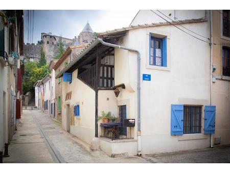 maison au pied de la cité de carcassonne