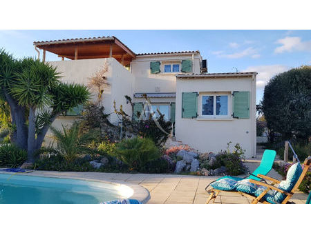 villa frontignan 5 pièce(s) 134 m2 avec garage et piscine sur une parcelle de 848m2.