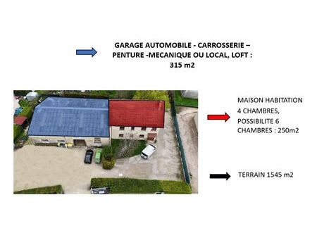 garage automobile de 300 m2 équipé : mécanique  la carrosserie et la peinture avec maison 
