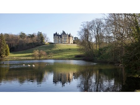 an exceptional listed neo-renaissance style chateau set in 70 hectares. 45 minutes from pa