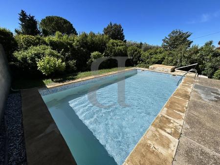 terrain constructible joliment arboré avec piscine et dépendance à morières-lès-avignon
