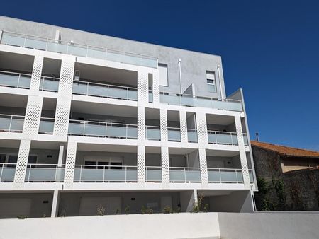 appartement neuf de type 3 avec terrasses et double parking