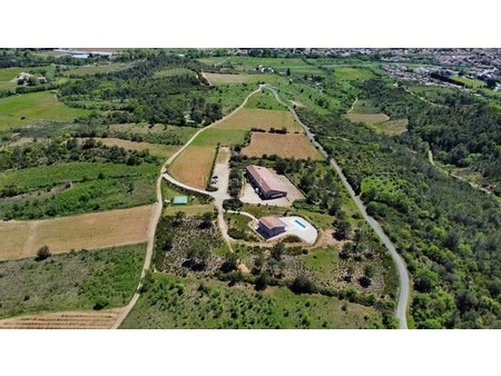 elegant vineyard property aop of the languedoc 38 ha with modern cellar and house    34500