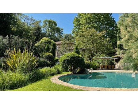 a unique place in this old 17th century mill  on 1.5 ha of land with a river  30 minutes f