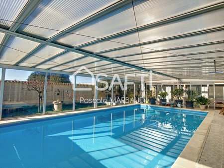 spacieuse villa de 4 chambres  avec dépendance de 40 m²  cave  triples garages et piscine 