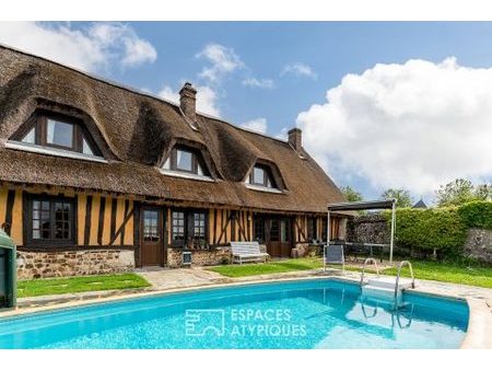 authentique chaumière avec piscine dans un environnement patrimonial