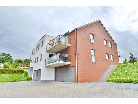 superbe appartement 2ch avec terrasse  cave et garage!