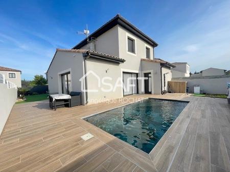 villa recente avec 4 chambres piscine et garage avec 2 places de parking sur 309m2