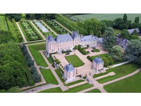 an exceptional listed louis xiii style chateau set in 40 enclosed hectares with formal fre