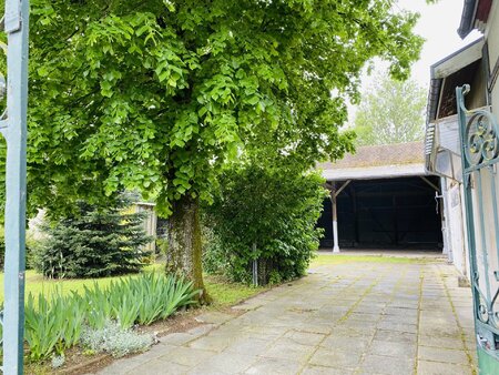 maison avec jardin  grand garage et hangar