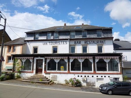 ancien hôtel de renom à réhabiliter idéalement situé