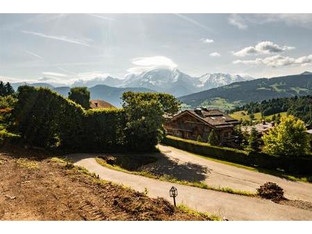 terrain constructible de 600 m² situé à combloux avec permis purgé de tous recours pour la