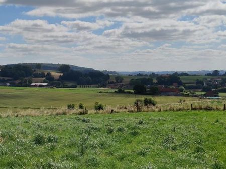 terrain de 18a 33ca avec une magnifique vue arrière