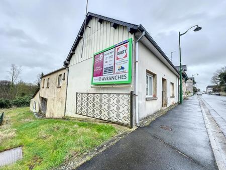 immeuble de trois logements avec garages !