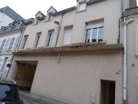 immeuble en plein centre-ville - 2 logements en duplex - 2 garages - 180 m²