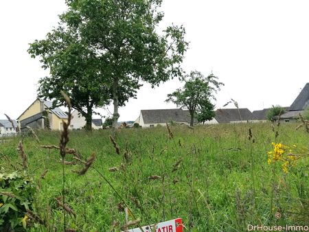 ref 75842- parcelle de terre à bâtir d'une superficie de 1200 m2 env