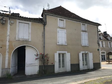 maison de bourg mitoyenne à rénover avec garage et jardinet non attenant