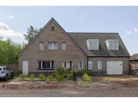 ruime woning op een prachtig perceel te koop!