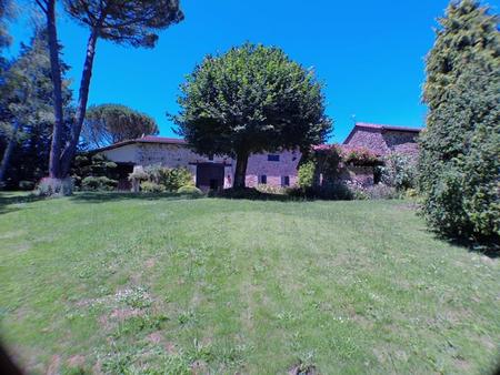 longère de 196m2  deux granges attenantes  un atelier  un terrain bord de rivière 2765m2