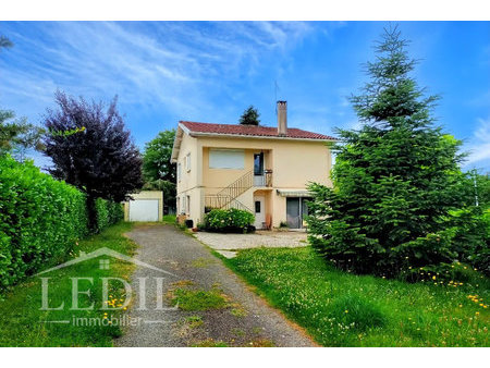 maison divisée en deux appartements et terrain