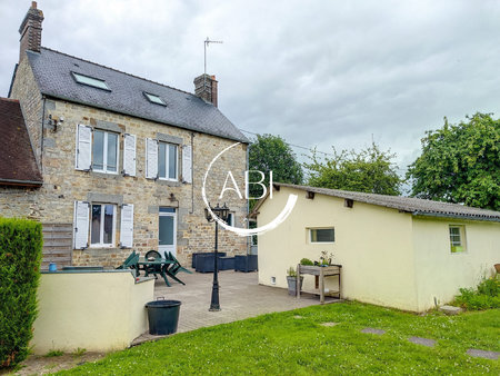 maison de 105 m² avec garage et bâtiment