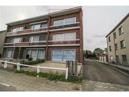 ruim appartement met garage en eigen tuin