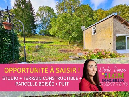 terrain constructible de 2 000m² avec une charmante maisonnette et une dépendance - cloyes