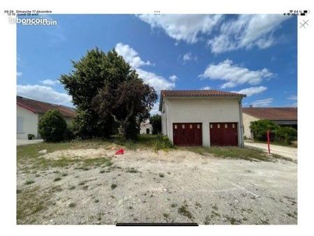 garage et terrain avec cu 400m de l’espace carat  quartier calme