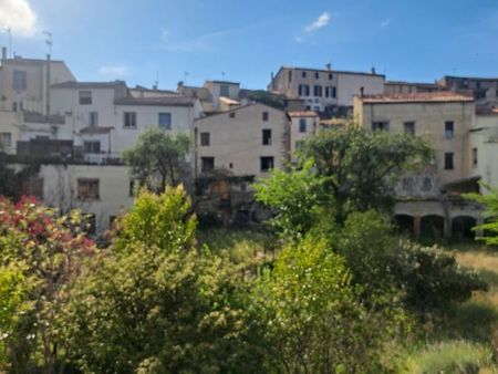 maison avec jardin  terrasse de toit et garage le tout dans un emplacement idyllique