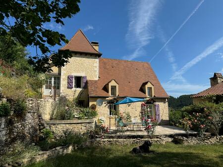 24250 - 2 maisons de caractère avec piscine au bord d'un village