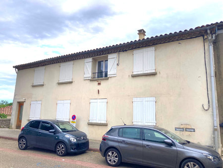 immeuble en r+1 avec local commercial et appartement sur un