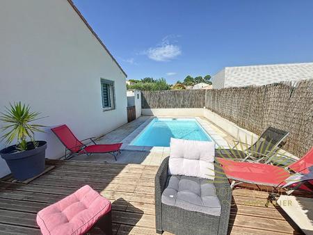 maison plain-pied de 125 m2 avec 4 chambres  bureau et piscine