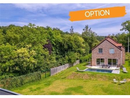 option - magnifique villa dans un écrin de verdure - peb a+