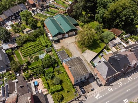 entrepôt de 600m2 + maison 4 chambres avec dépendance