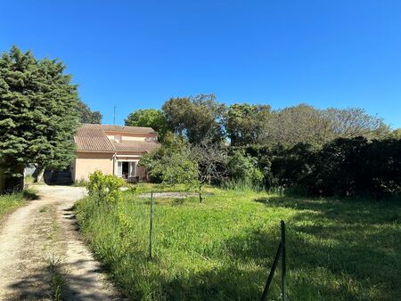 exclusivité st quentin la poterie. maison avec 2 logements. terrain 1800 m²